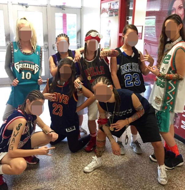A photo of Memorial High School students wearing cornrows and fake tattoos for Spirit Week. 