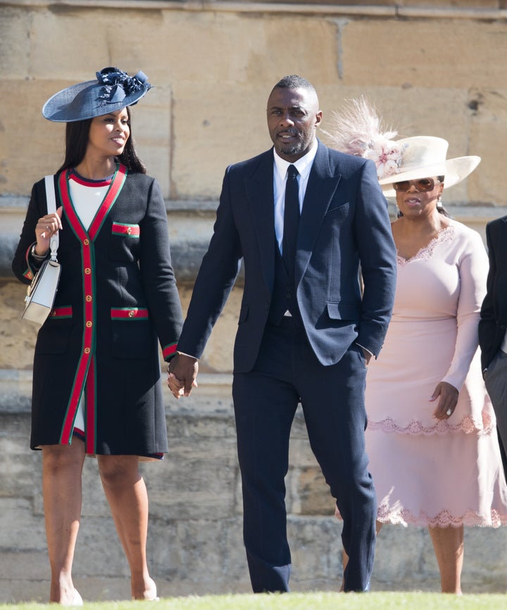 Sabrina Dhowre, Idris Elba and Oprah Winfrey attend the royal wedding.