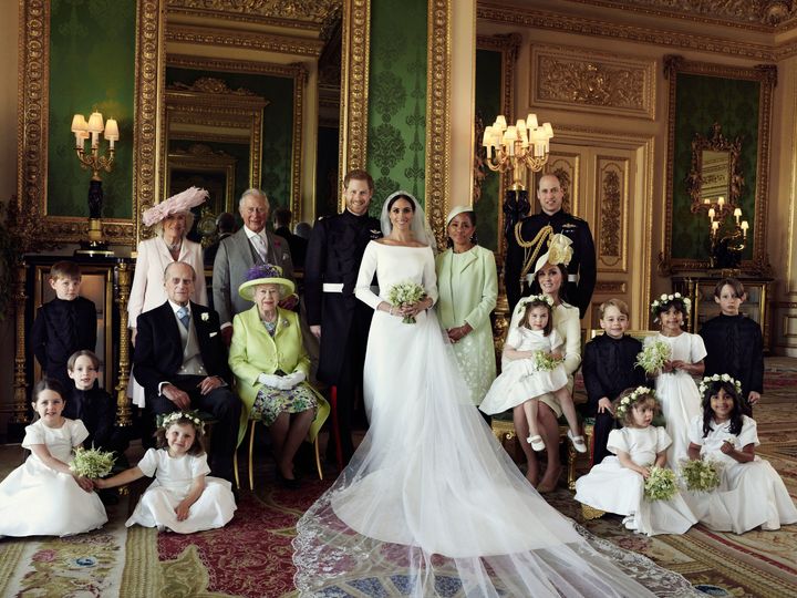 Meghan and Harry pose with their wedding party.