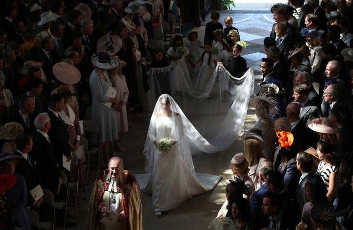 Meghan walks down the aisle on her wedding day.