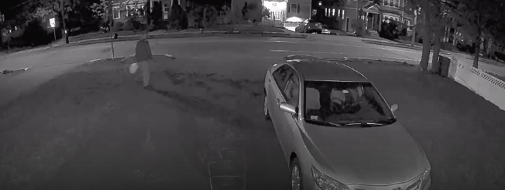 Surveillance video outside the home of Rabbi Avi Bukiet shows a suspicious person walking by.