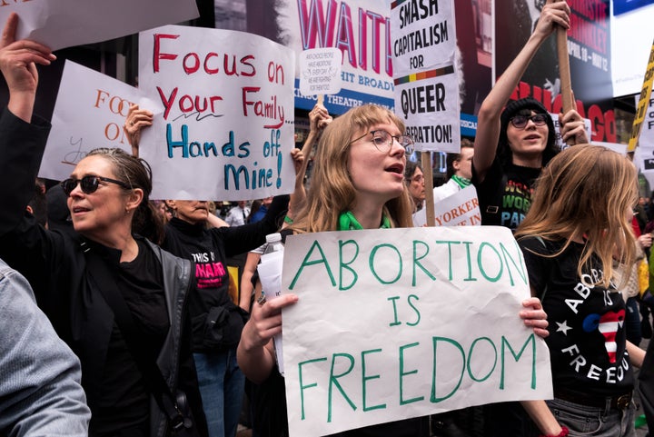 Pro-choice activists protest Alabama's near-total ban on abortion.