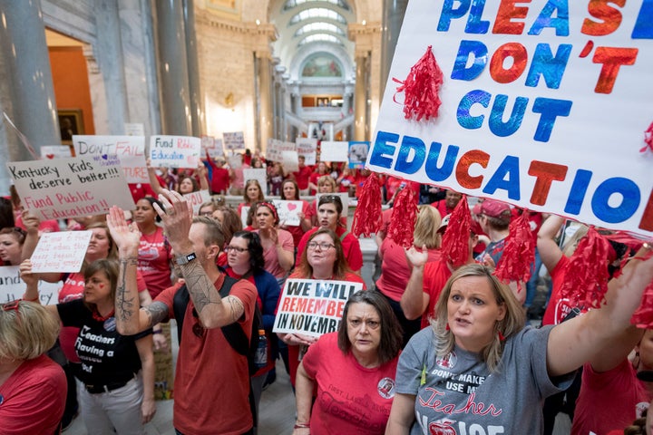 Teachers from across Kentucky gather inside the state Capitol in Frankfort to rally for increased funding and to protest changes to their state funded pension system on April 13, 2018.