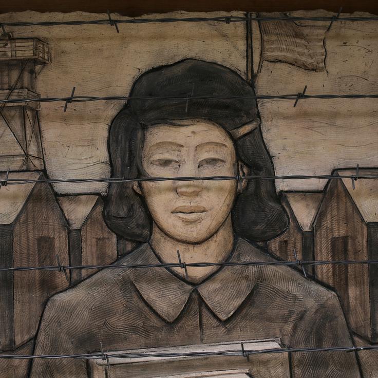 A frieze from the Japanese American Exclusion Memorial on Bainbridge Island, Washington. The memorial lists the names of the island's Japanese American residents incarcerated by the U.S. government in the wake of Japan's bombing of Pearl Harbor during World War II.