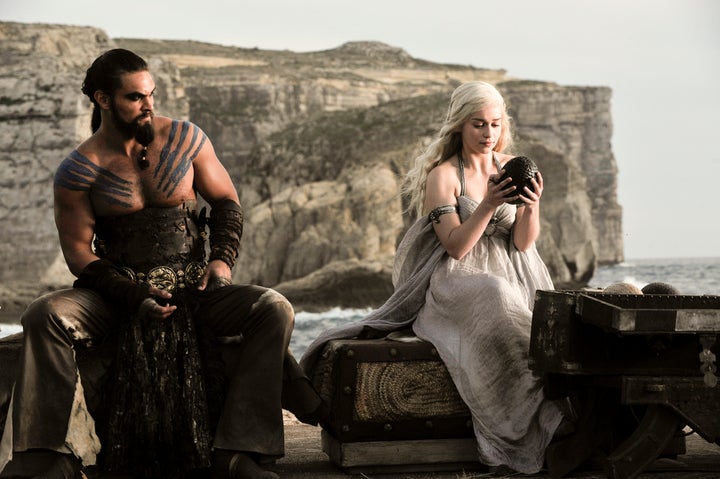 Dany with Khal Drogo at their wedding reception. She received three dragon eggs from Magister Illyrio. 