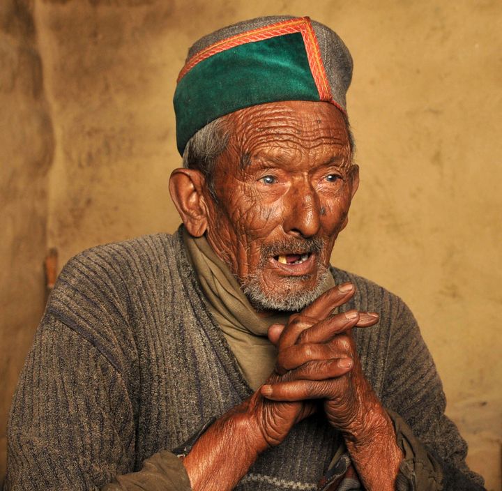 In this photograph taken on April 24, 2014, then ninety-seven year old Indian resident Shyam Saran Negi, speaks at his home at Kalpa in Kinnaur District in Himachal Pradesh.