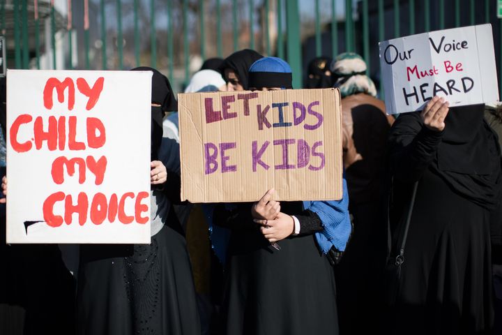 Parents, children and protestors demonstrate against the lessons about gay relationships and LGBT rights at Anderton Park Primary School, Birmingham