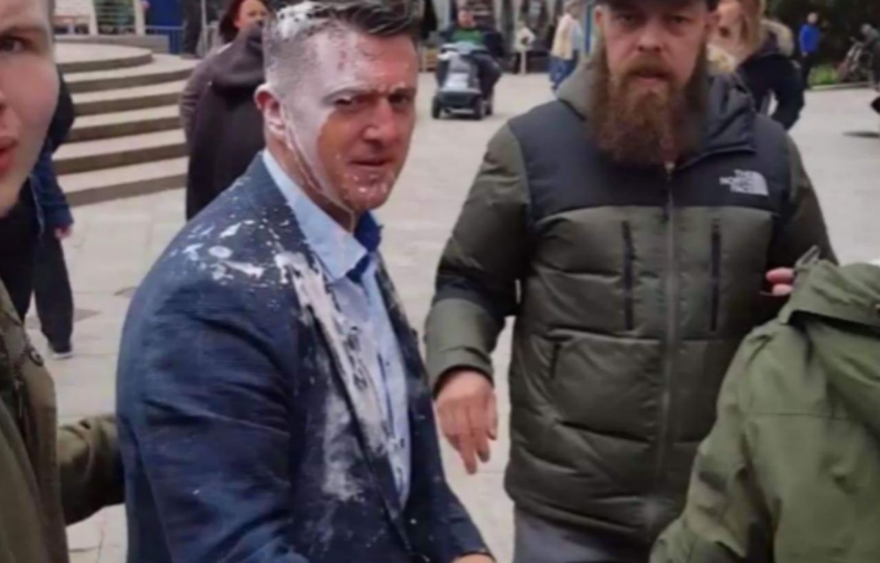 Tommy Robinson seconds after being "milkshaked" in Warrington last month.