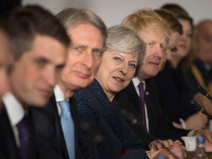 Philip Hammond alongside Theresa May and former Cabinet colleague Boris Johnson