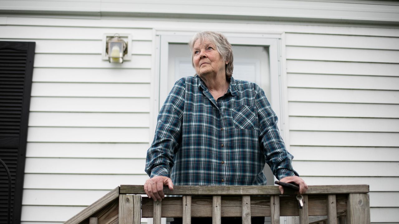 Kathy Zorotheos poses for a portrait outside of her home in the resident-owned Oak Hill Mobile Home Park on May 19, 2019, in Taunton, Massachusetts.