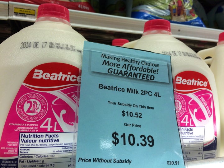 A price tag shows the cost of a four-litre jug of milk at a grocery store in Iqaluit on Dec. 8, 2014. 