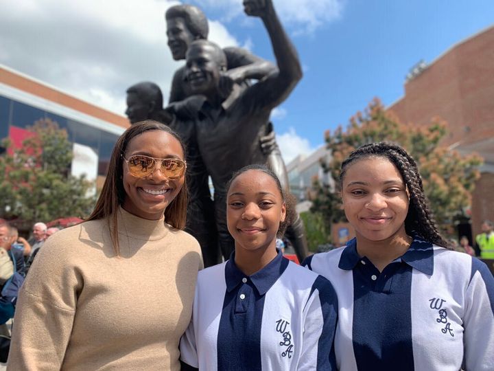 The late Cyrille Regis' daughter Michelle, and granddaughters Jada and Renee.