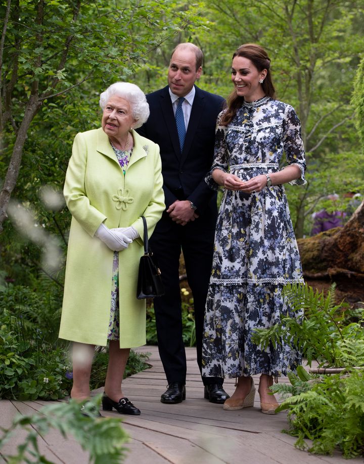 Queen Elizabeth II is shown around "Back to Nature" by Prince William and Catherine, Duchess of Cambridge. 