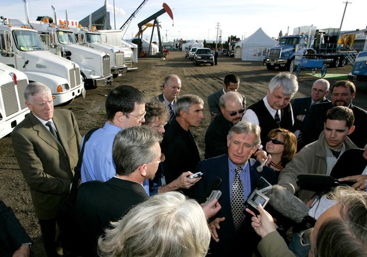 Alberta Premier Ralph Klein speaks to reporters at the Lloydminster Heavy Oil Show on Sept. 14, 2004, in Lloydminster, Alta.