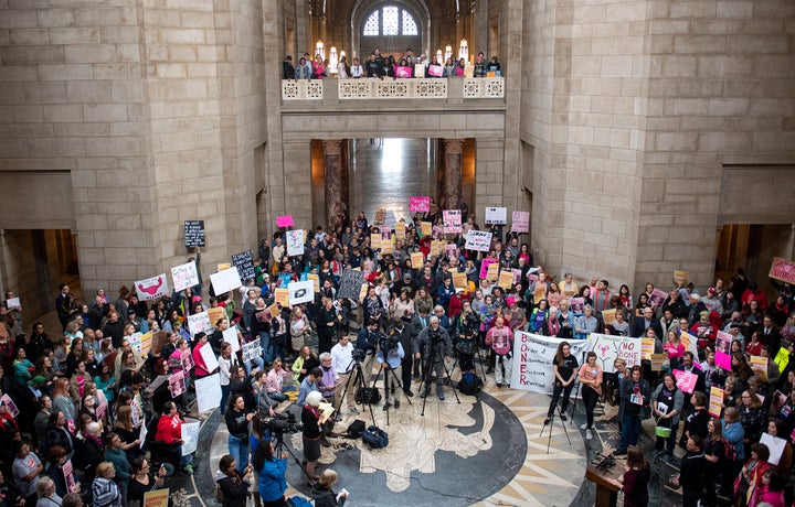 People gather in the Capitol Rotunda in Lincoln, Nebraska, for a reproductive freedom rally on Tuesday.