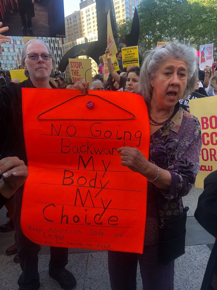 A protester at the Foley Square #StopTheBan rally in New York City. She told HuffPost that her mother fought for legalizing abortion and "now we're fighting to keep it for our grandchildren."