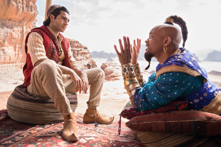 Mena Massoud and a non-blue Will Smith in "Aladdin."