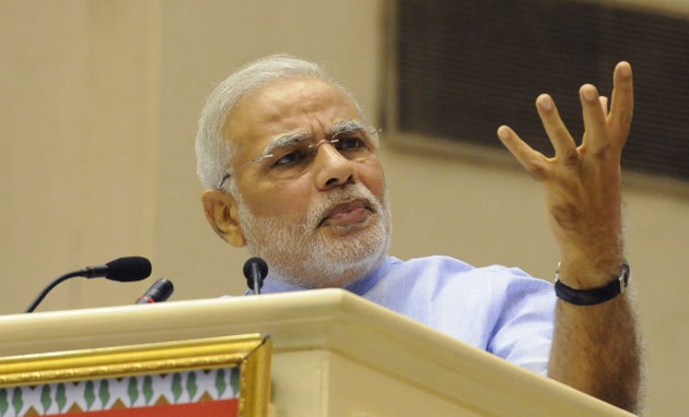 Prime Minister Narendra Modi speaks during the launch of Pradhan Mantri Jan Dhan Yojna at Vigyan Bhawan...