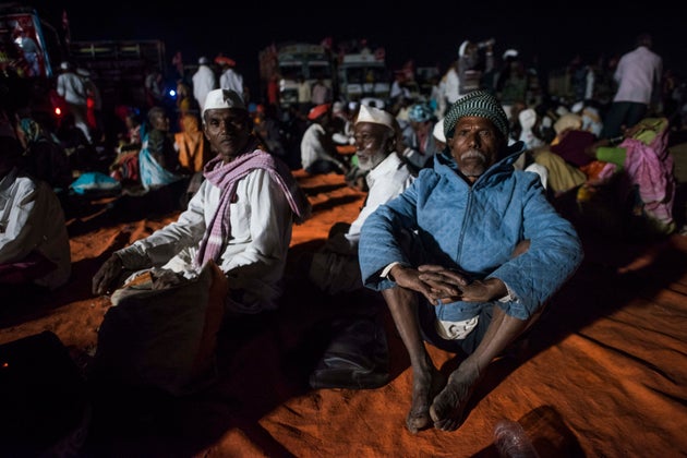 Farmers take a halt as they are marching from Nashik to Mumbai near Ambebahula village on February 21,...