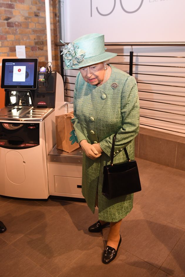 Her Majesty was shown a replica of a Sainsbury's self-service till on a visit to a pop-up store.