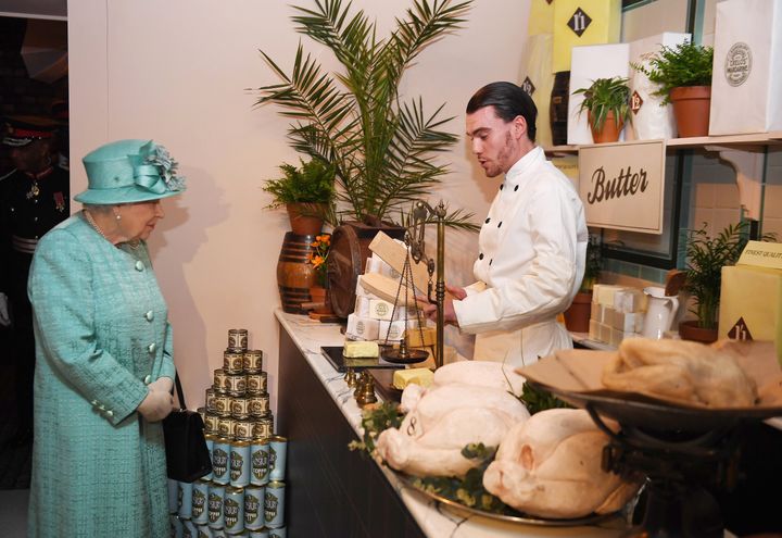 The Queen saw a range of goods at a replica of Sainsbury's first-ever store.