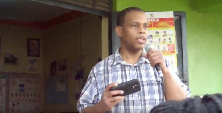 A screen shot from a Global Healing Christian Missions YouTube video shows a man preaching about the benefits of "natural healing" in Uganda.