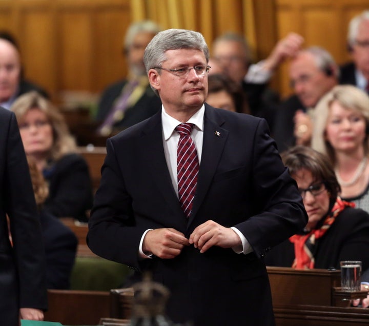 Former prime minister Stephen Harper votes against Stephen Woodworth's motion in the House of Commons on Sept. 26, 2012.