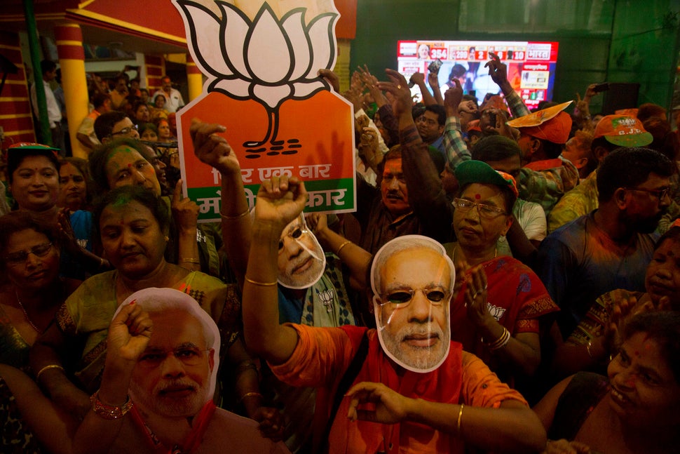 BJP supporters celebrate in their party's Assam state office in Gauhati, India, on May 23, 2019.&nbsp;