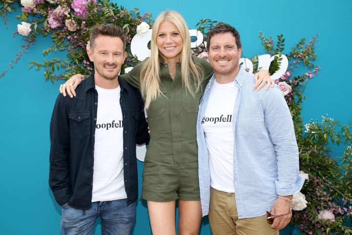 Goop CEO Gwyneth Paltrow poses with Dr. Will Cole, left, and Seamus Mullen, the co-hosts of the new "Goopfellas" podcast, at the In goop Health Summit Los Angeles 2019 on May 18.
