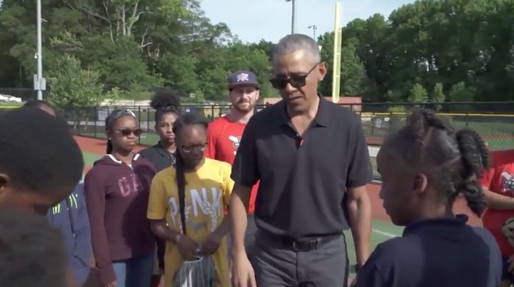 Former President Barack Obama visits kids in the Washington Nationals Youth Baseball Academy's after-school program.