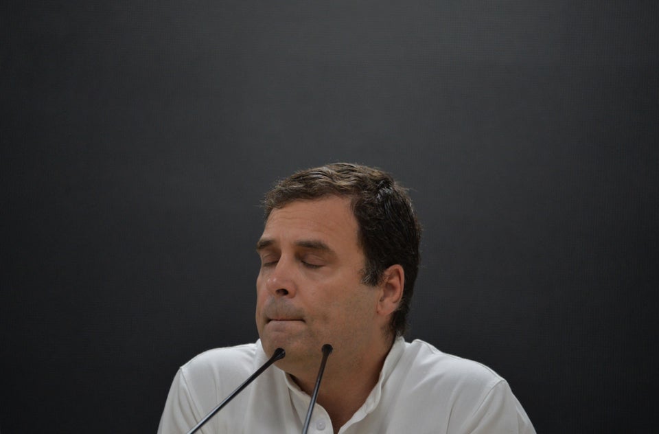 Indian National Congress Party president Rahul Gandhi gestures as he speaks during a press conference...