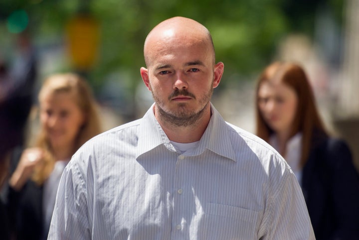 Former Blackwater Worldwide guard Nicholas Slatten leaves federal court in Washington after the start of his first-degree murder trial, June 11, 2014.