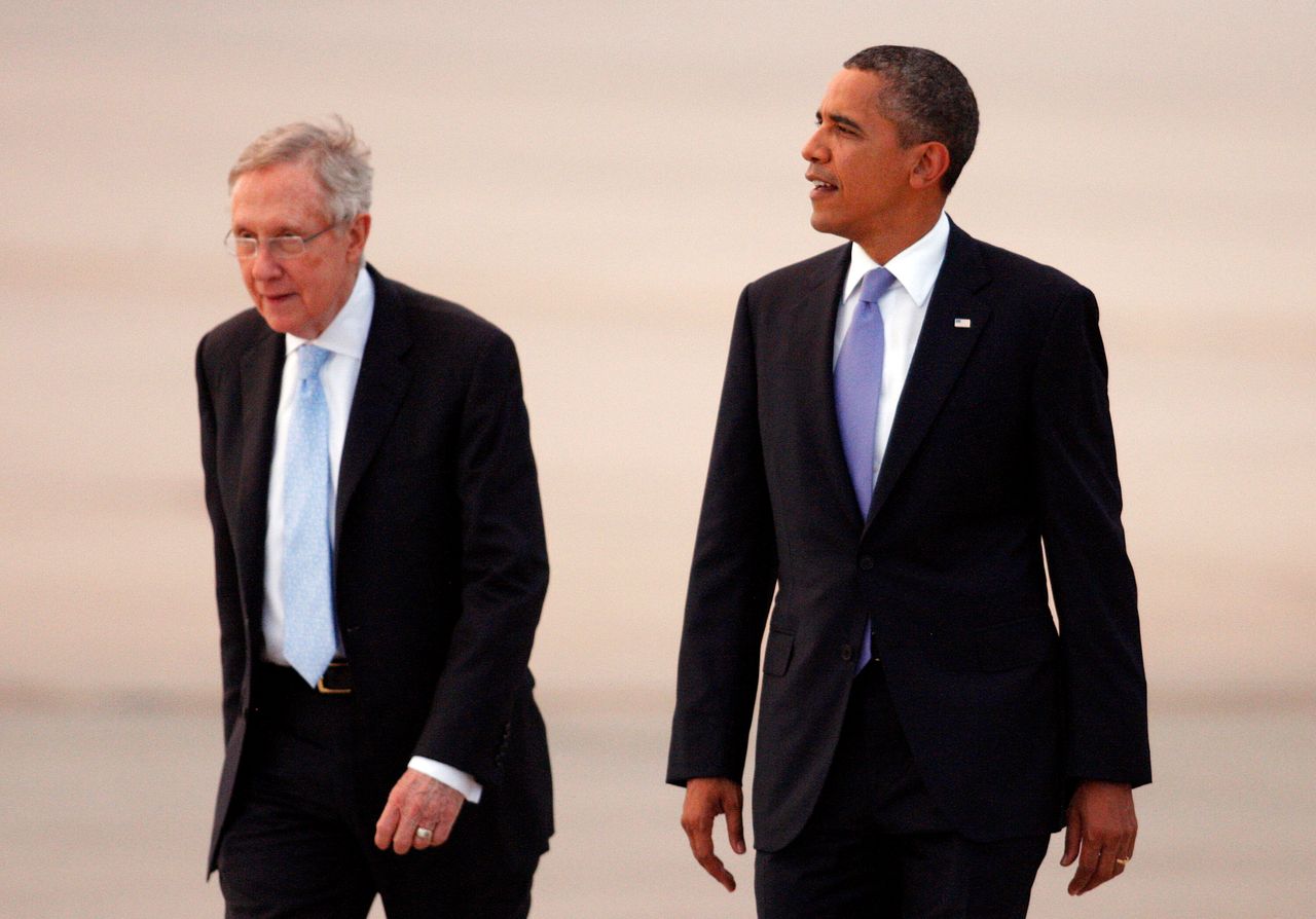 Then-Senate Majority Leader Harry Reid (left) played a significant role in the repeal of "don't ask, don't tell" in 2010, during the tenure of President Barack Obama.