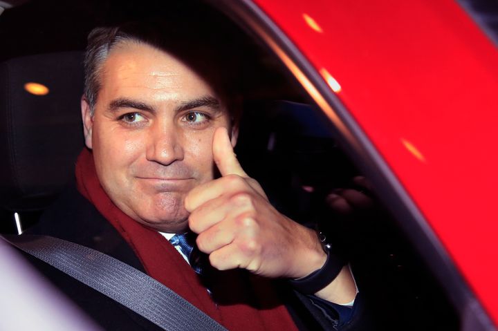 Jim Acosta gives a thumbs up after a federal court appearance that resulted in the return of his White House press pass that the Trump administration had revoked last November.