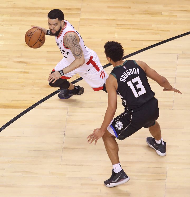 Fred VanVleet of the Raptors, left, faces off against Malcolm Brogdon of the Milwaukee Bucks during Game 6 of the NBA Eastern Conference Final at Scotiabank Arena on May 25, 2019 in Toronto.