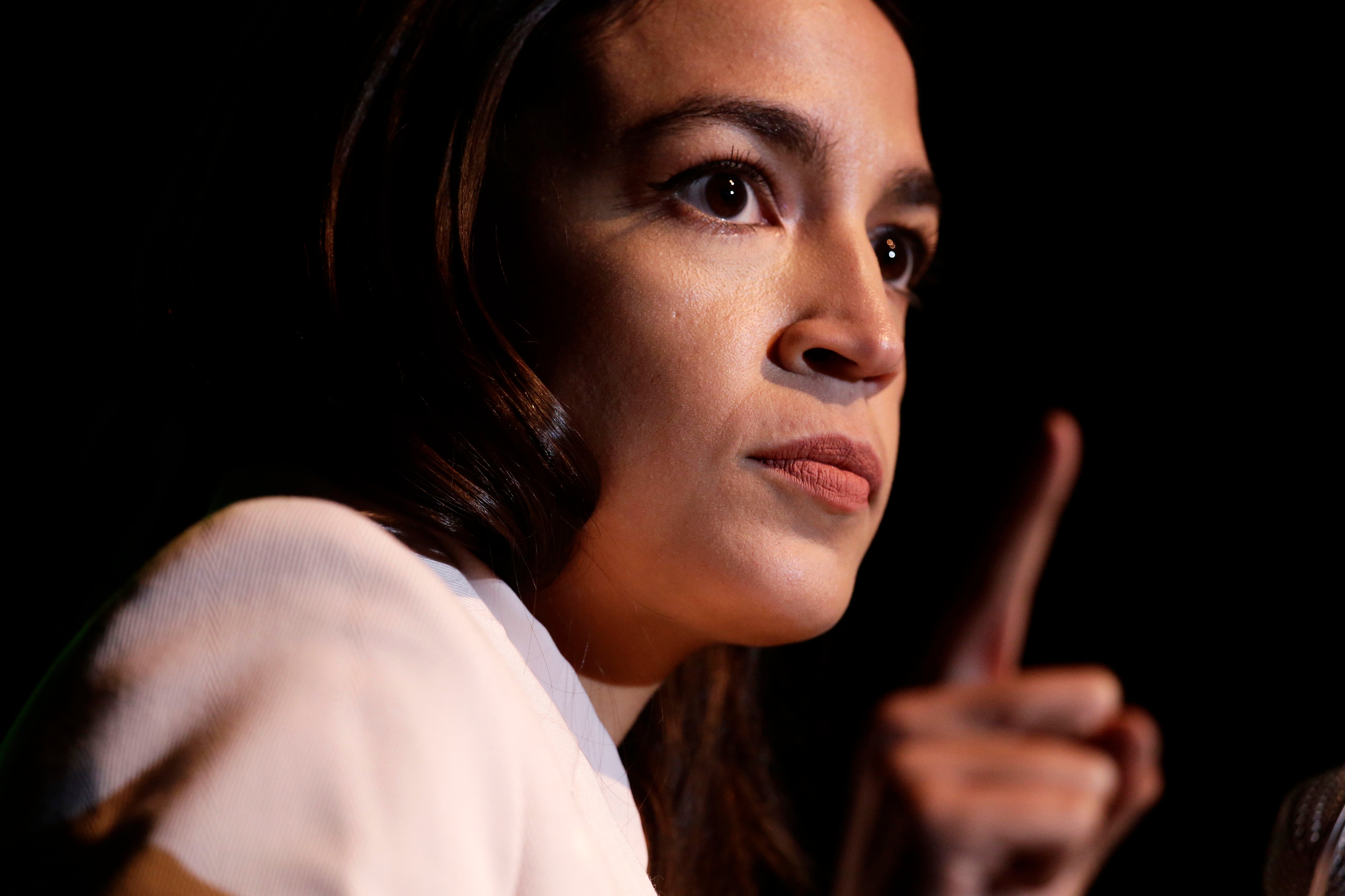 WASHINGTON, DC - MAY 13: U.S. Rep. Alexandria Ocasio-Cortez (D-NY) speaks during a rally at Howard University May 13, 2019 in Washington, DC. The Sunrise Movement held an event for the final stop of the "Road to a Green New Deal" tour to "explore what the pain of the climate crisis looks like in D.C. and for the country and what the promise of the Green New Deal means." (Photo by Alex Wong/Getty Images)