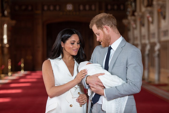 Meghan Markle and Prince Harry show off baby Archie on May 8, 2019. Meghan is probably counting the minutes until she can rip off that outfit and get back into her maternity leggings.