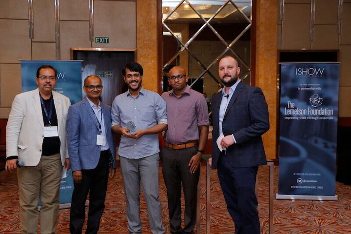 Arvind Badrinarayanan (middle) and Sumukh Mysore (second from right) aka Smokey the Ghost, of Muse Diagnostics, receiving the finalists prize at ISHOW (Innovation Show) by ASME.