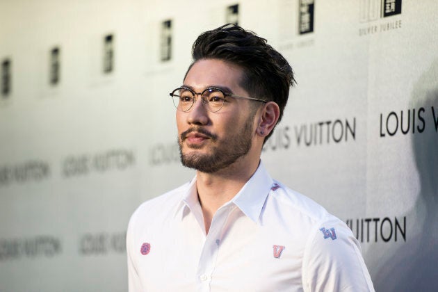 Godfrey Gao poses at the opening night of the Time Capsule Exhibition by Louis Vuitton in April in Hong Kong.