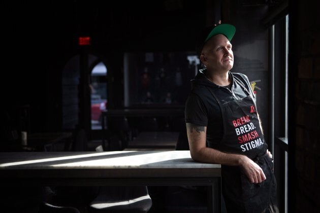 Volunteer chef Mikiki, who has been living with HIV for 10 years, poses for a portrait at the pop up restaurant June's HIV+ Eatery in Toronto, Tues. Nov. 7.
