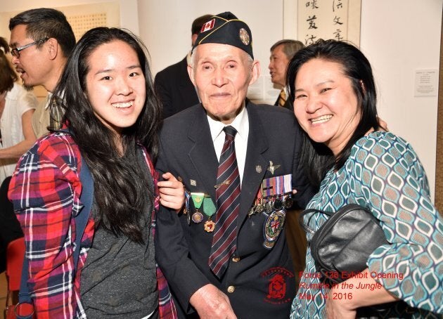 Force 136 member Charlie Lee poses for a photograph with his daughters.