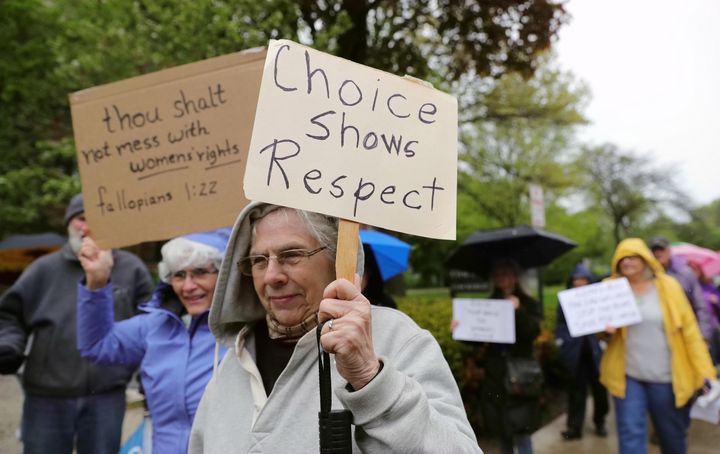 People participate in a protest against Alabama's abortion ban at Lorraine H. Morton Civic Center in Evanston, Illinois on May 21, 2019.