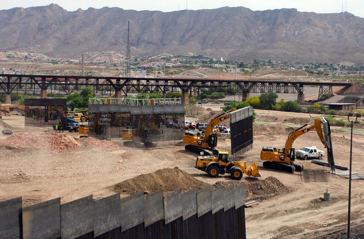 Construction on the wall began quickly over the weekend as local residents were expected to "freak out" over it, Steve Bannon reportedly said. 