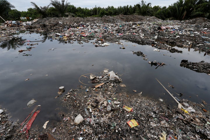 Plastic waste is seen dumped at a palm oil plantation in Telok Panglima Garang, Malaysia in October.