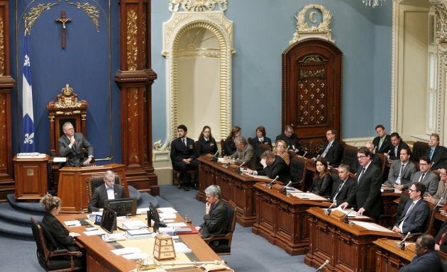 A Christian crucifix hangs over the National Assembly in Quebec City.