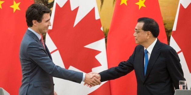 Prime Minister Justin Trudeau shakes hands with Chinese Premier Li Keqiang (right) at a news conference in Beijing, Dec. 4, 2017. Canada is planning new tariffs and quotas on steel from China and certain other as-yet unknown countries, according to a news report.