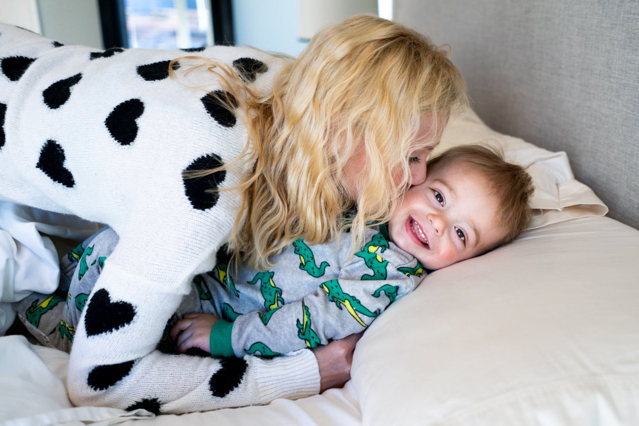 Amber Freed snuggles with her son, Maxwell Freed, 2, as they get ready to start the day at their home in Denver on May 11, 2019.