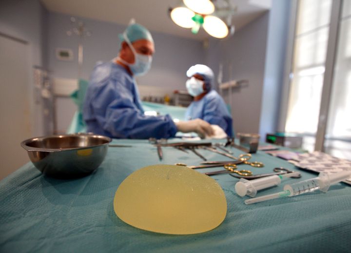 A textured breast implant is visible during a procedure in Nice, France.