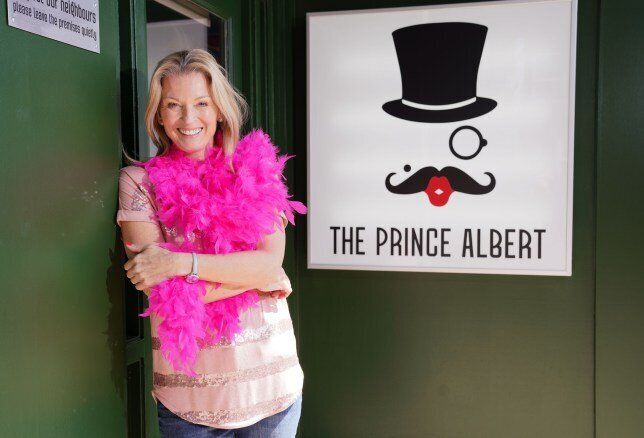 Kathy (Gillian Taylforth) outside her new gay bar, The Prince Albert