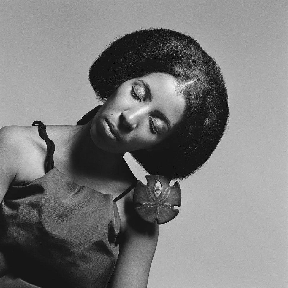 Carolee Prince, African Jazz-Art Society & Studios (AJASS), Harlem, circa 1964, wearing her own jewelry designs. Prince created much of the jewelry and headpieces featured in Brathwaite’s work. From "Kwame Brathwaite: Black Is Beautiful" (Aperture, 2019).